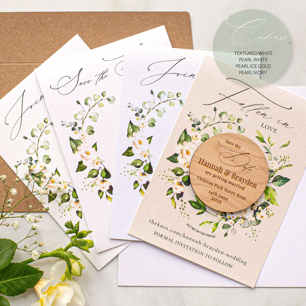 White floral save the date magnets with cards